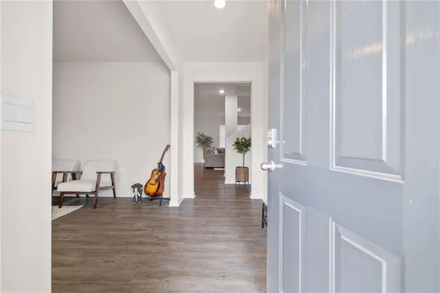 a view of a living room and bathroom