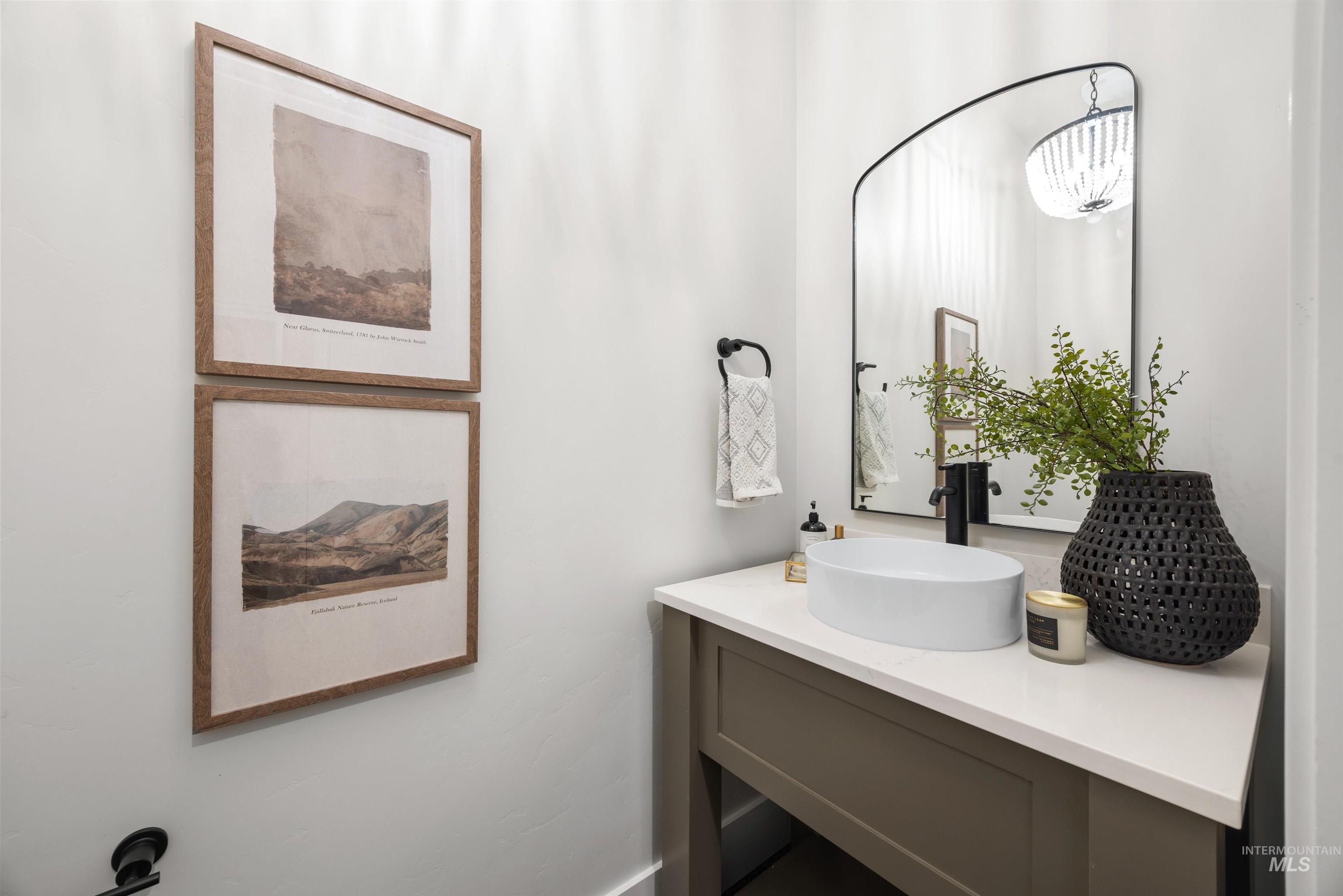 5940 South Pinpoint Way Meridian, ID 83642 - Photo 35 of 40 Vanity with a white countertop and an oval vessel sink