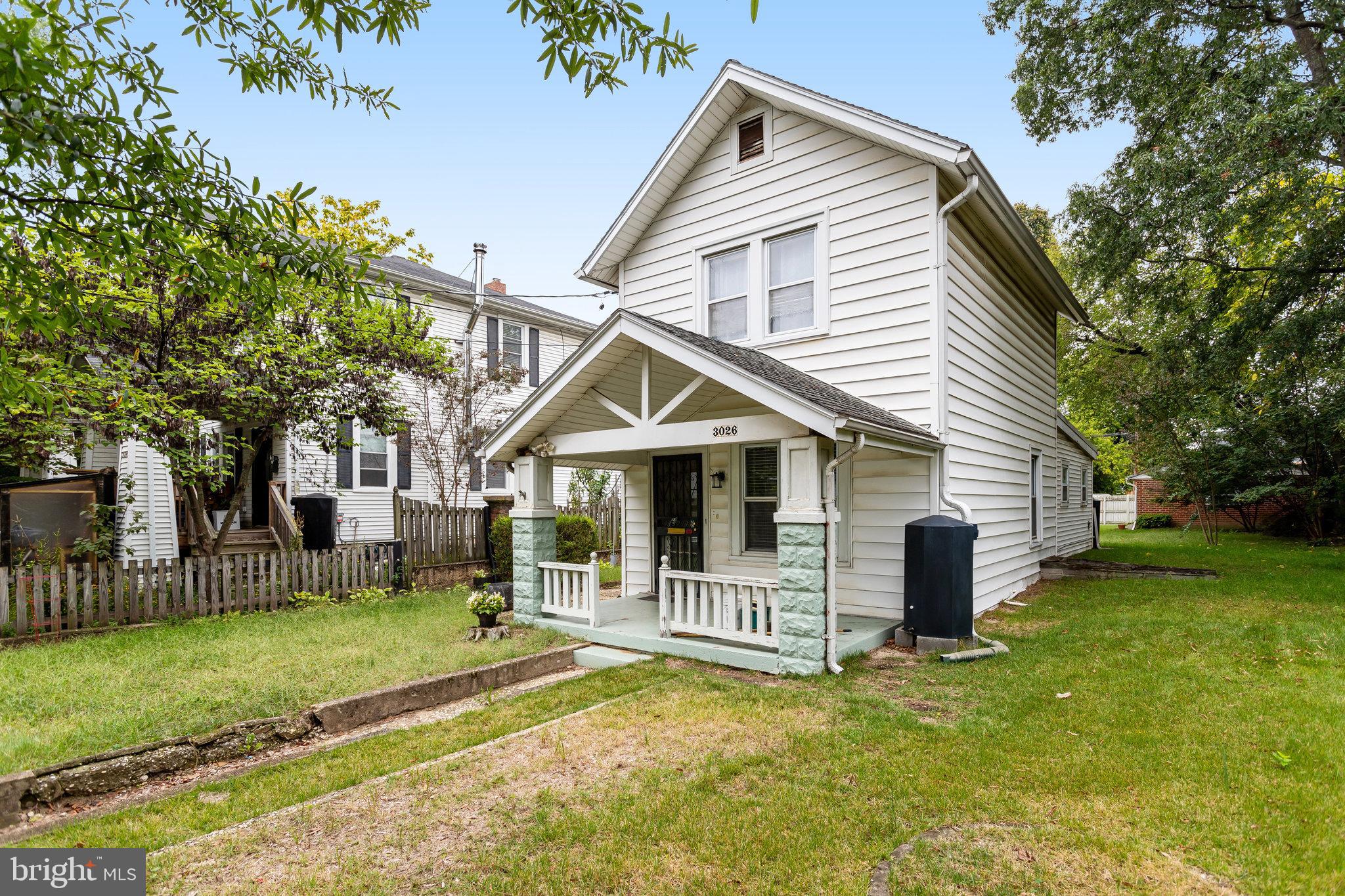 3026 Channing Street Northeast Washington, DC 20018 - Photo 2 of 24 a view of a house with a yard and fence