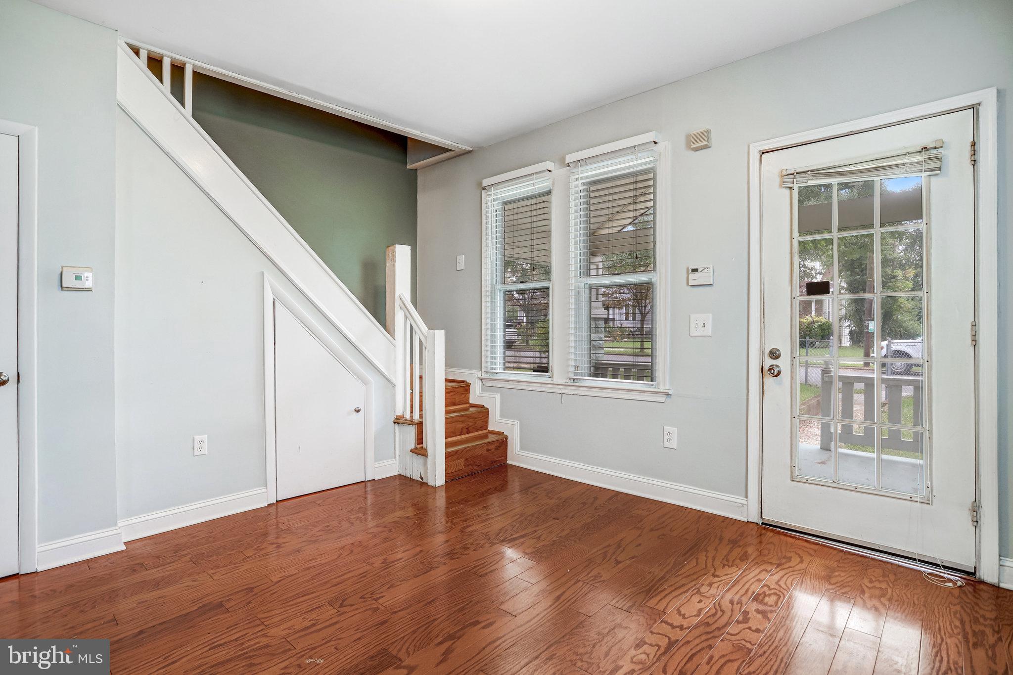 3026 Channing Street Northeast Washington, DC 20018 - Photo 3 of 24 a view of an entryway with wooden floor and door
