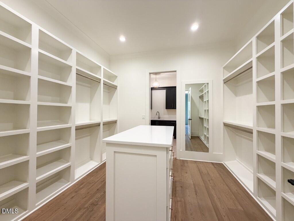 7441 Summer Tanager Trail Raleigh, NC 27614 - Photo 15 of 48 a view of a kitchen with wooden floor and a window
