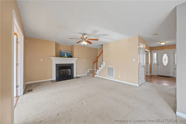 a view of a livingroom with a fireplace
