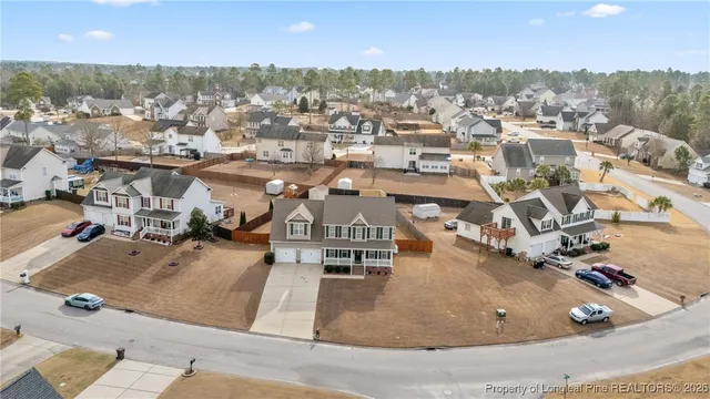 an aerial view of a highlighted house