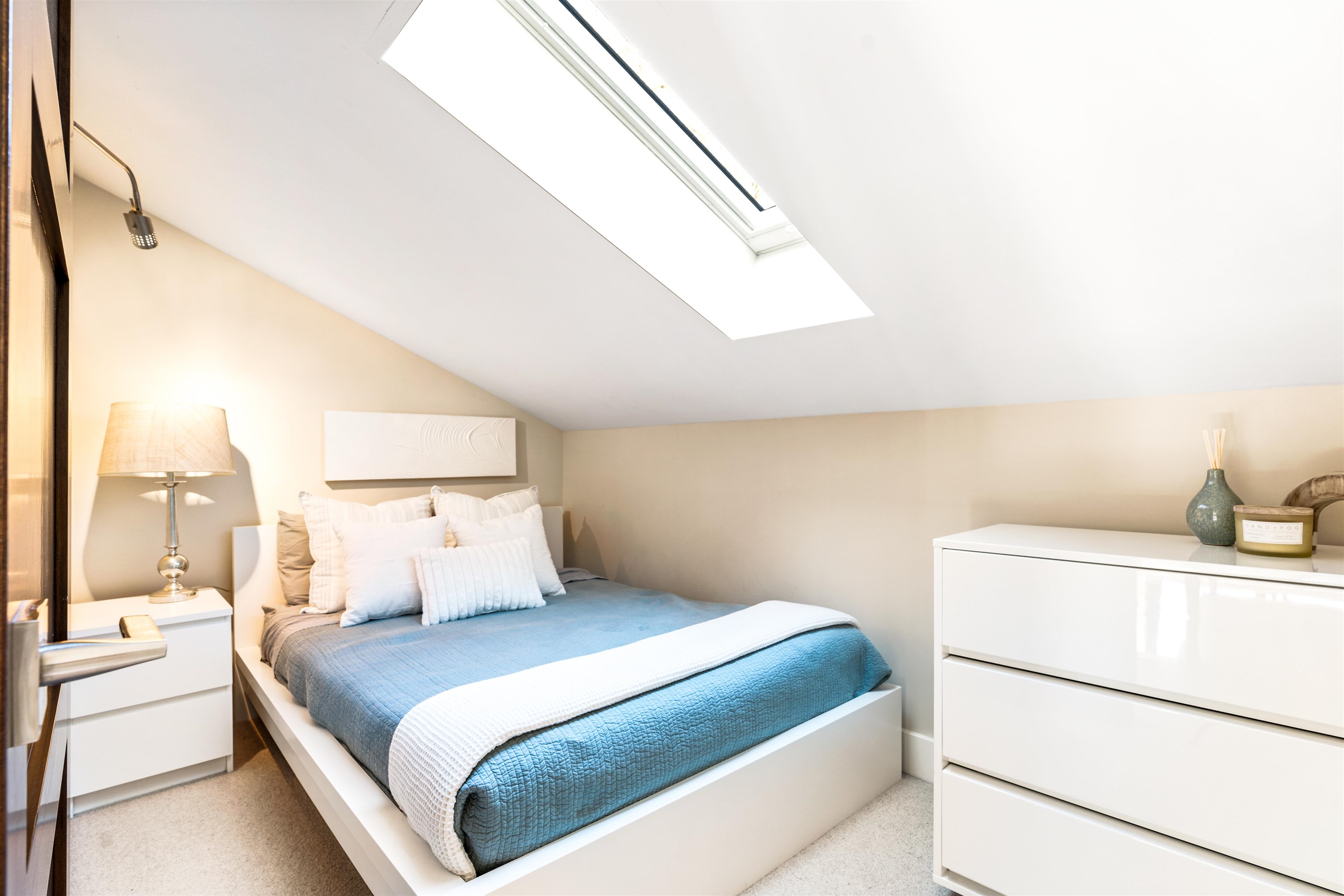 3003 Meadow Court, Unit 1 Olympic Valley, CA 96146 - Photo 18 of 24 a bedroom with a bed and a cabinets