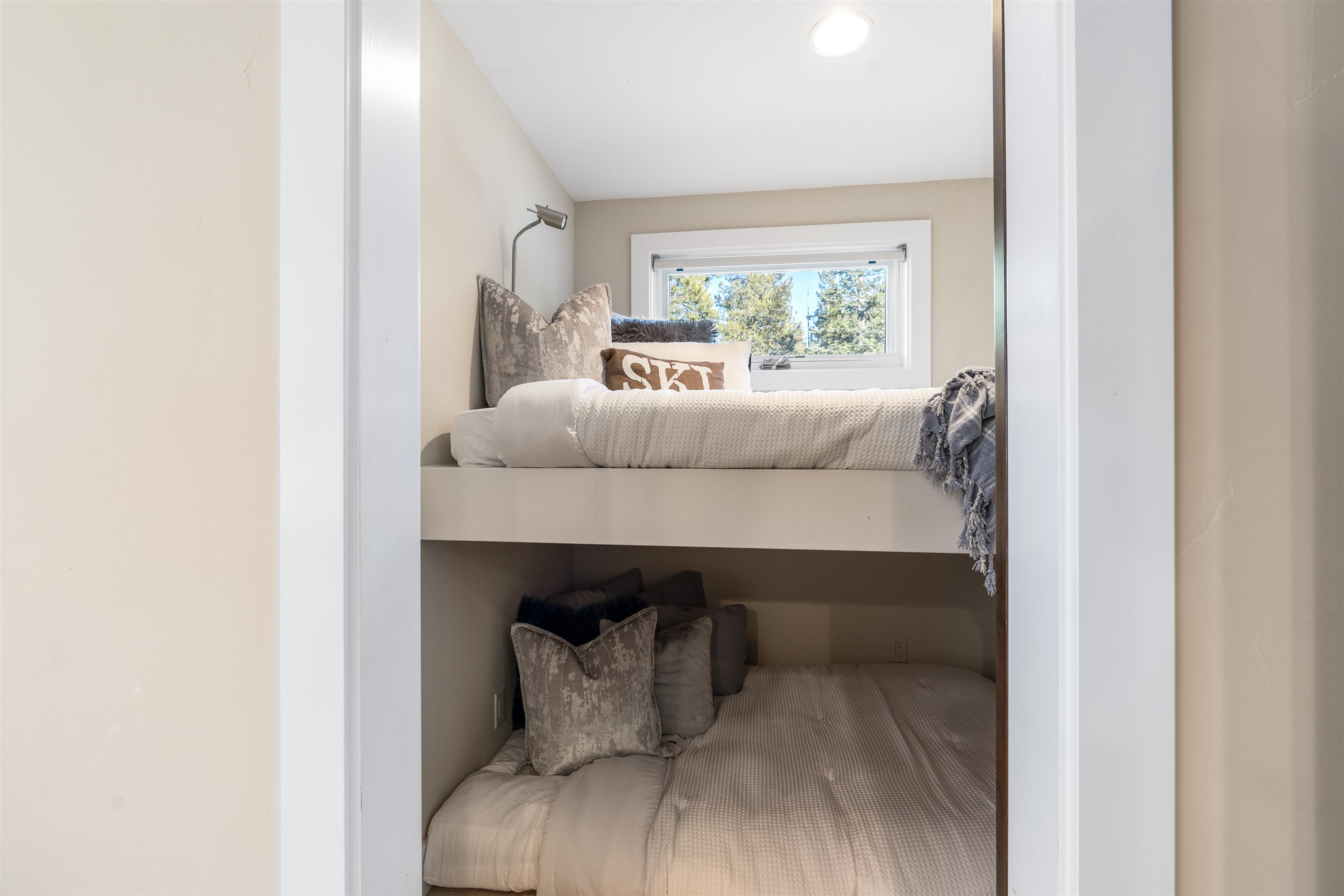 3003 Meadow Court, Unit 1 Olympic Valley, CA 96146 - Photo 20 of 24 a bedroom with a bed and window