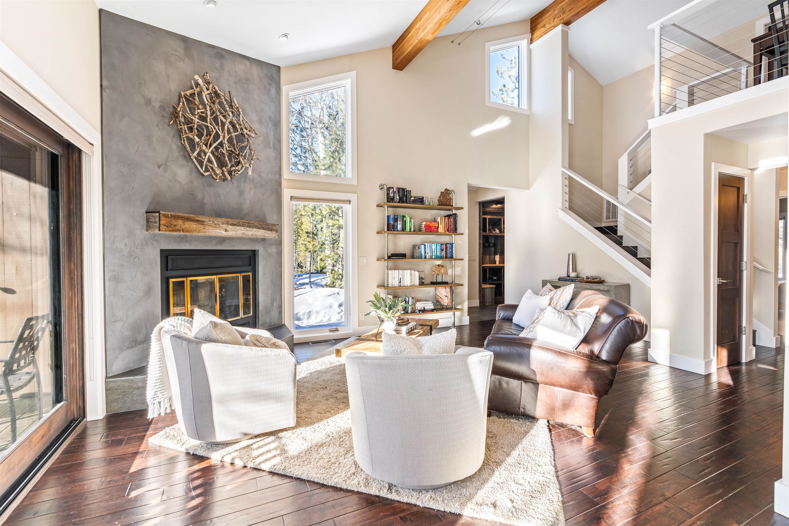 3003 Meadow Court, Unit 1 Olympic Valley, CA 96146 - Photo 6 of 24 a living room with furniture and a fireplace