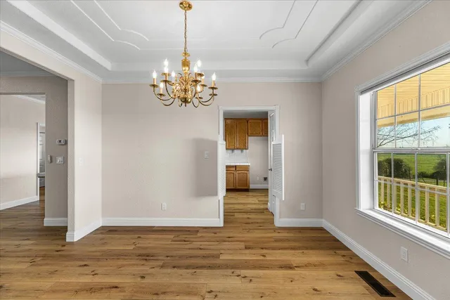 a spacious bathroom with a shower sink and mirror