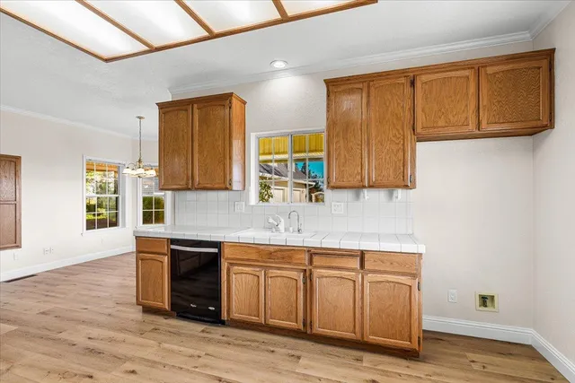 a view of staircase with wooden floor and stairs