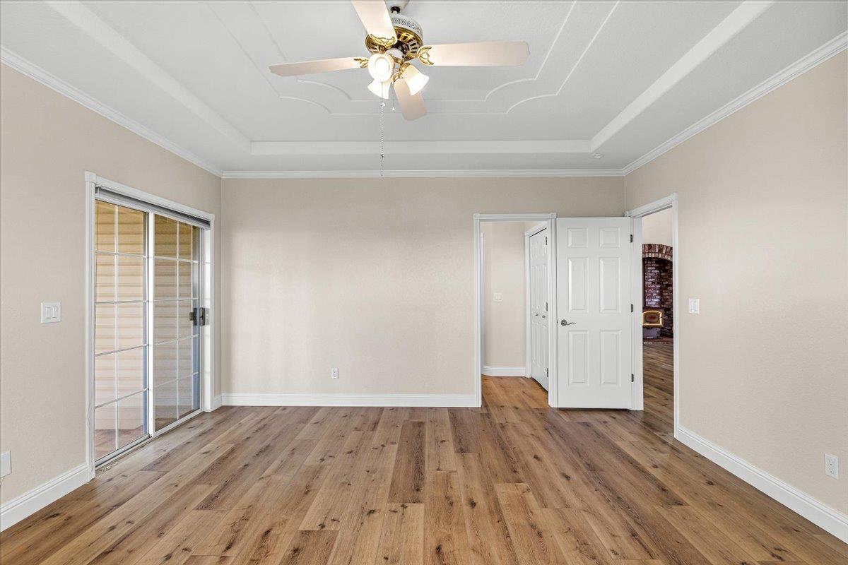 12900 Angrave Road Herald, CA 95638 - Photo 36 of 99 wooden floor in an empty room with a window