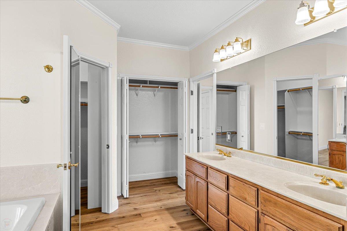 12900 Angrave Road Herald, CA 95638 - Photo 39 of 99 a spacious bathroom with a shower sink and mirror