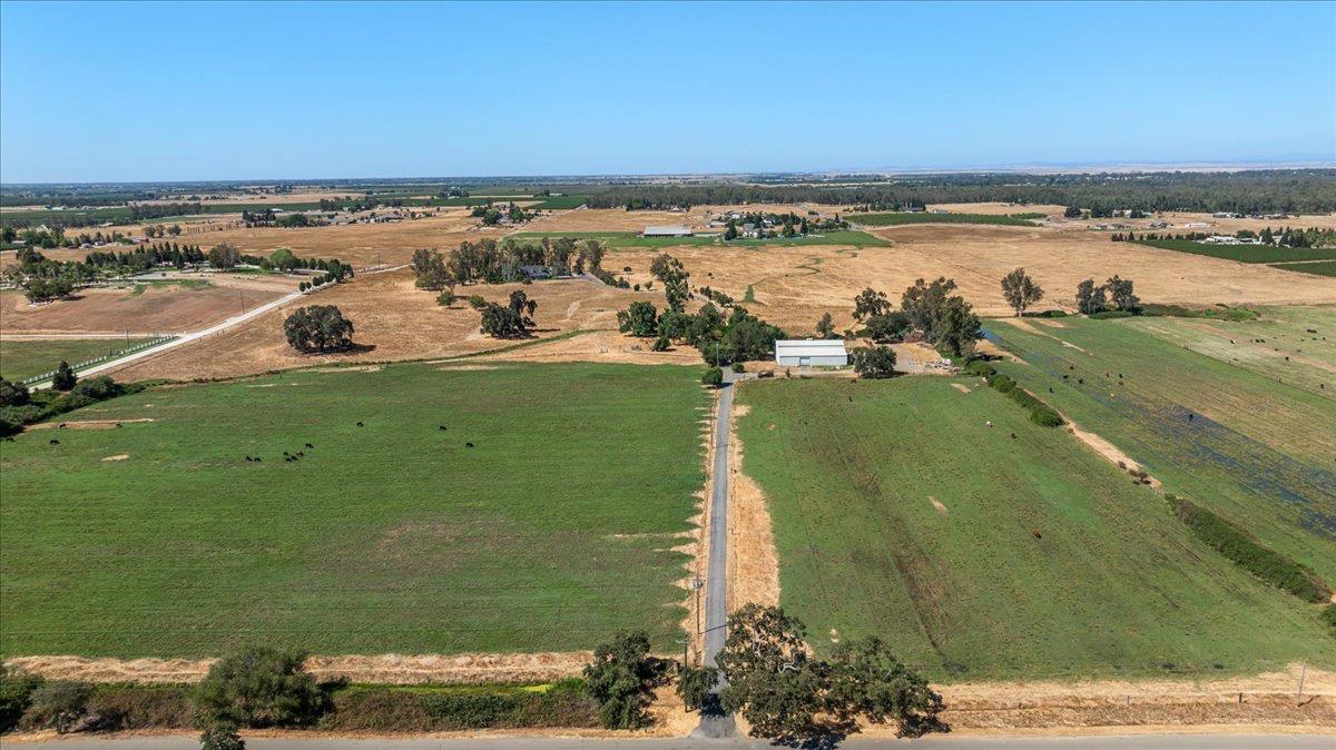 12900 Angrave Road Herald, CA 95638 - Photo 90 of 99 a view of a lake with a yard