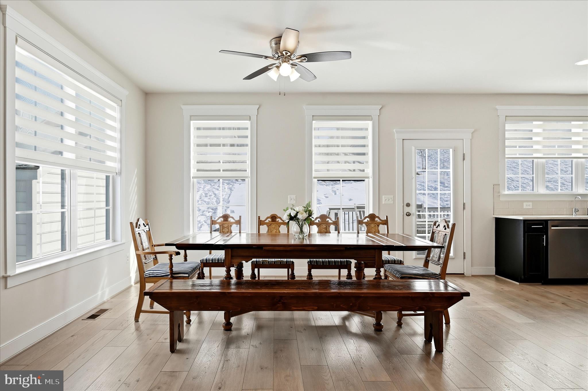 35939 Fieldside Way Round Hill, VA 20141 - Photo 19 of 82 a view of a dining room with furniture window and wooden floor
