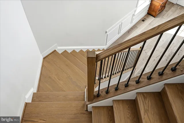 a spacious bedroom with a bed and a couch