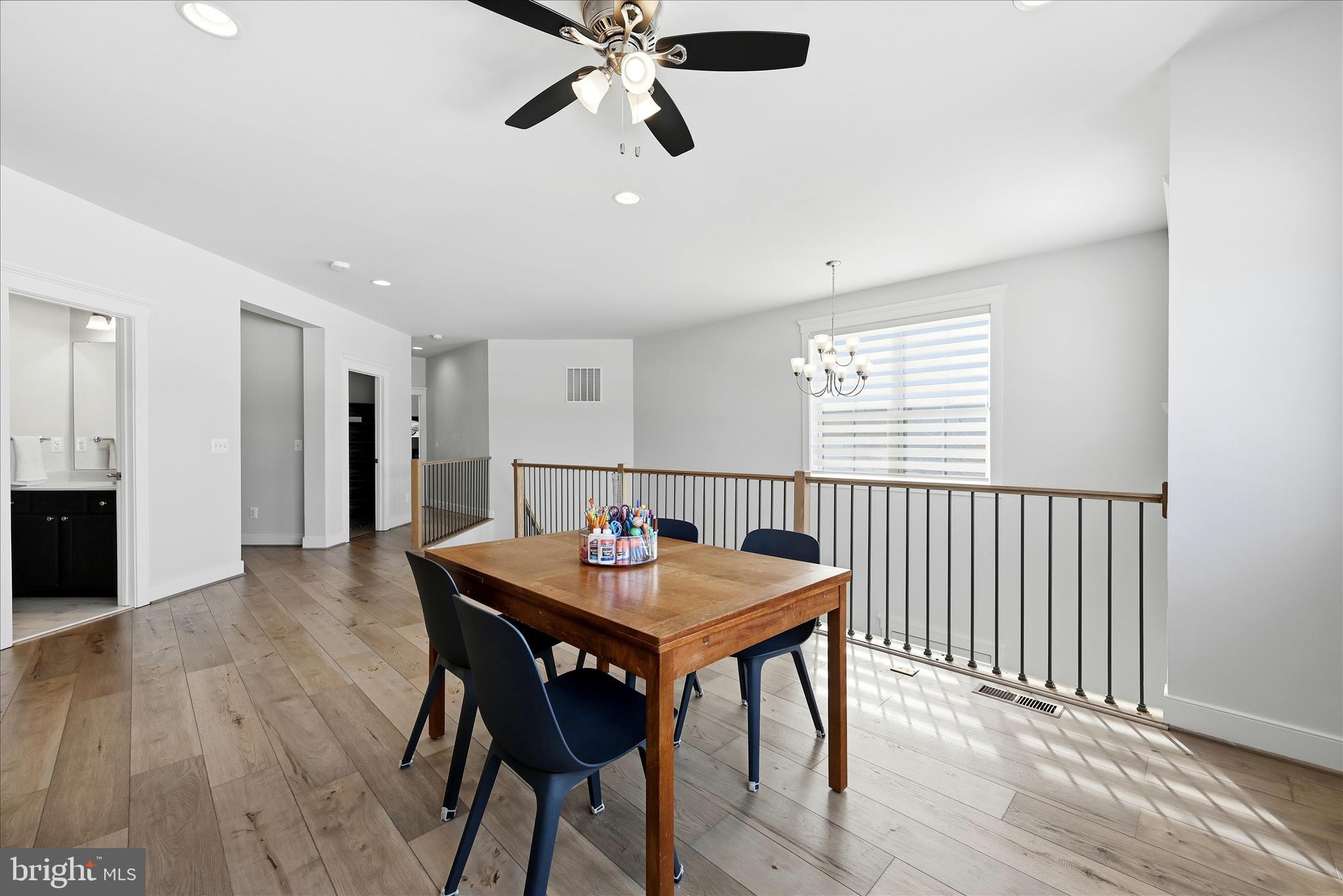 35939 Fieldside Way Round Hill, VA 20141 - Photo 36 of 82 a view of a dining room with furniture and wooden floor
