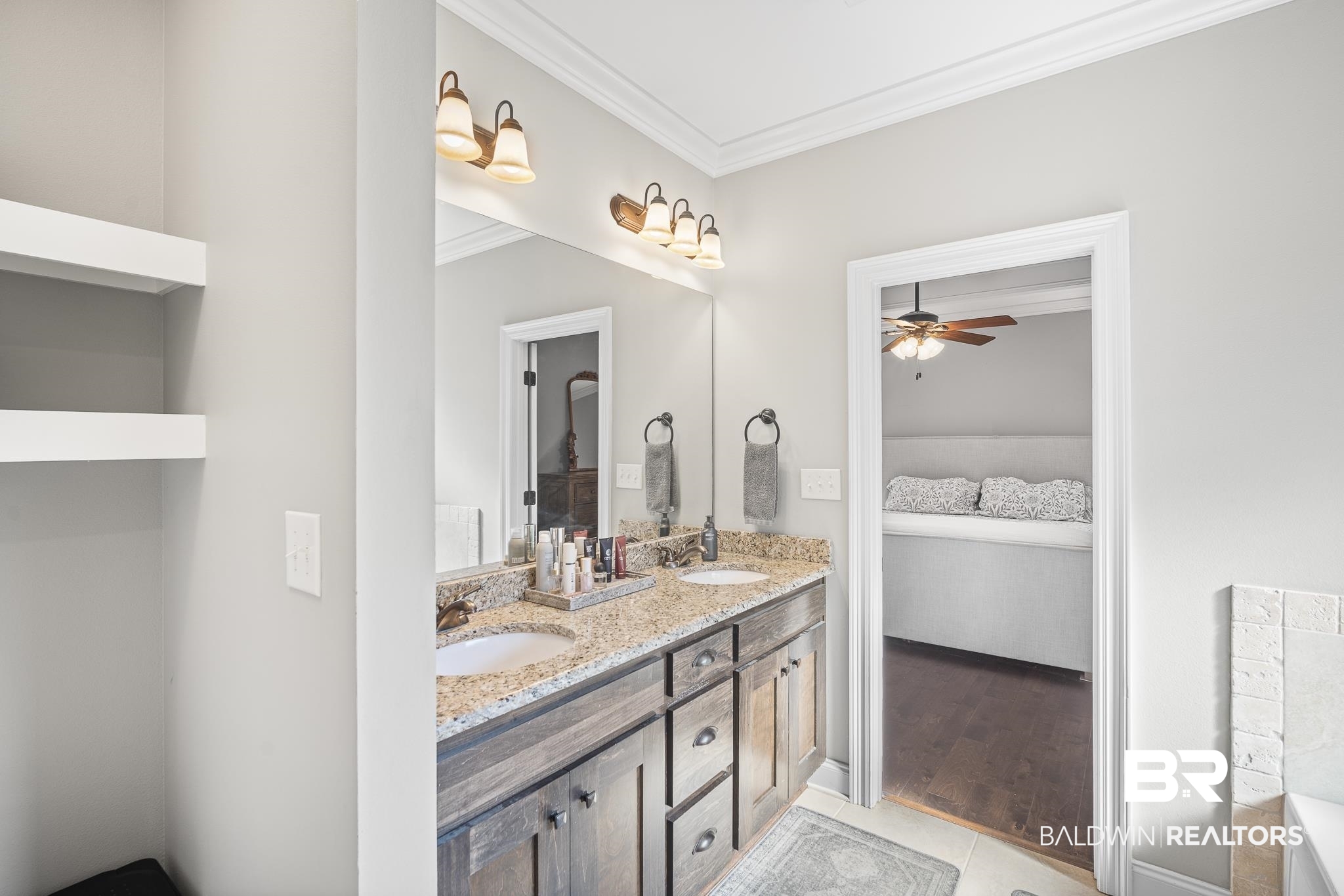 8594 Rosedown Lane Daphne, AL 36526 - Photo 21 of 30 Bathroom featuring double vanity, a soaking tub, and tile patterned floors