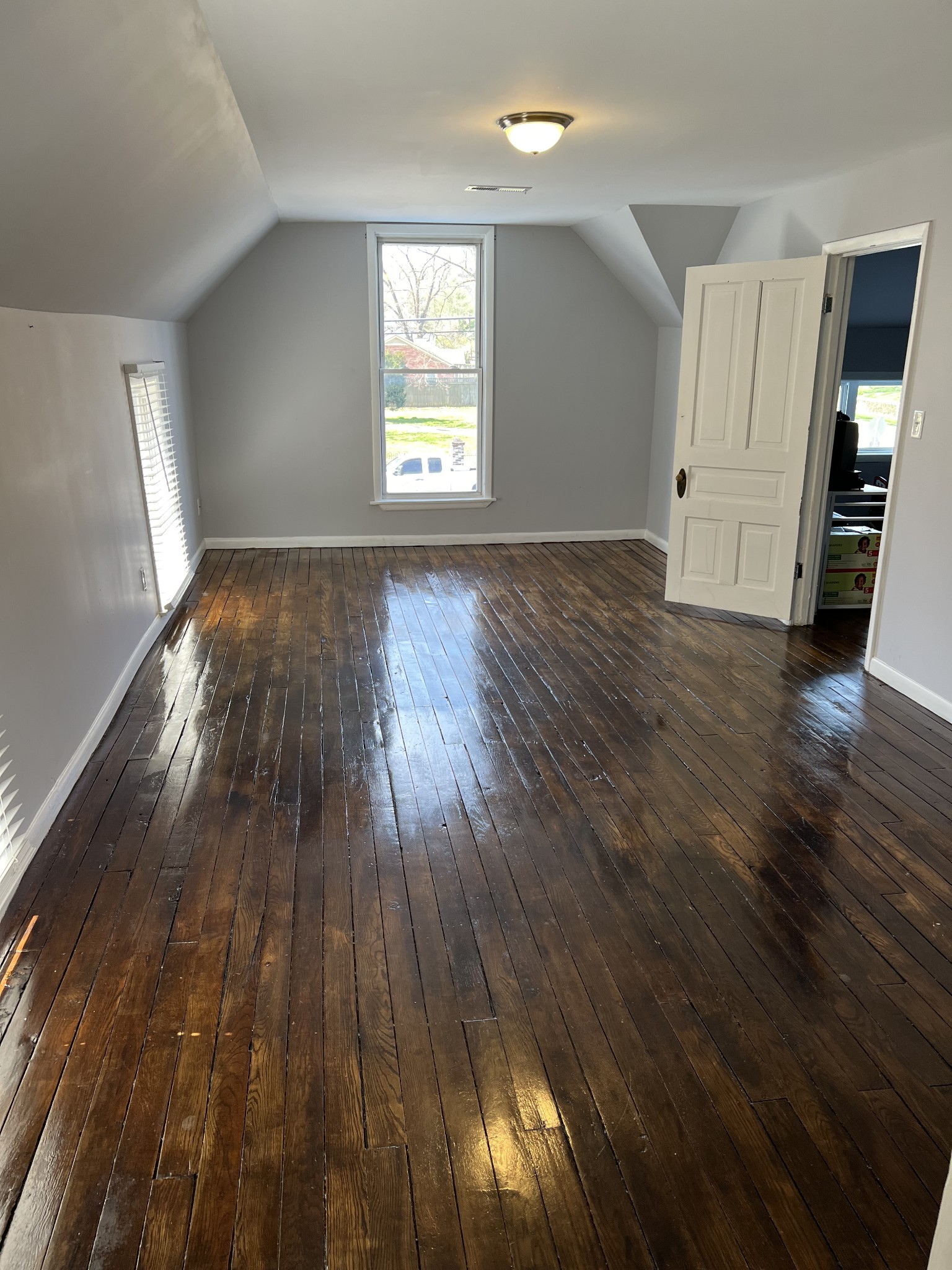 201 Pleasant Street Mount Pleasant, TN 38474 - Photo 32 of 38 an empty room with wooden floor and windows