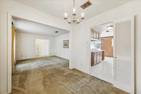 a view of a livingroom with a chandelier