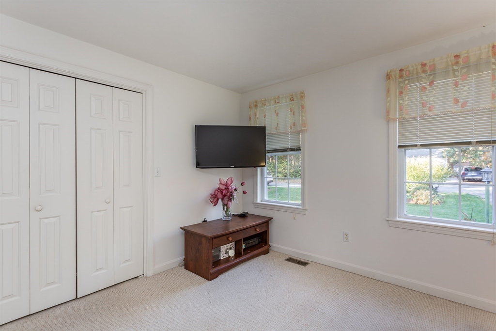 20 Sandy Way Mashpee, MA 02649 - Photo 11 of 33 a living room with furniture and a flat screen tv