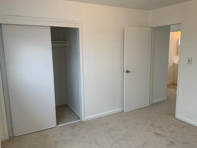 an empty room with closet