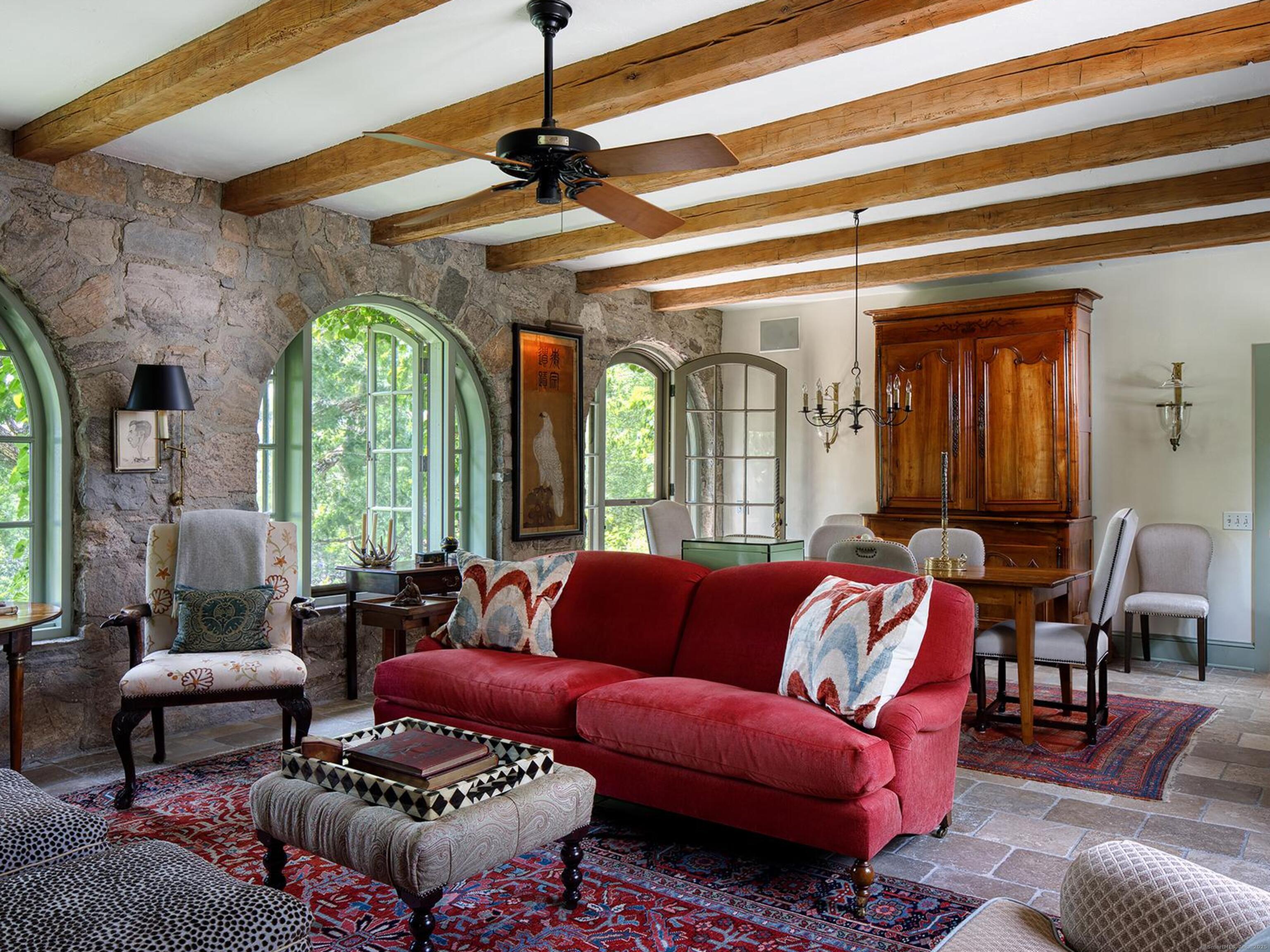 213 Beaver Brook Road Lyme, CT 06371 - Photo 15 of 38 a living room with furniture and a large window