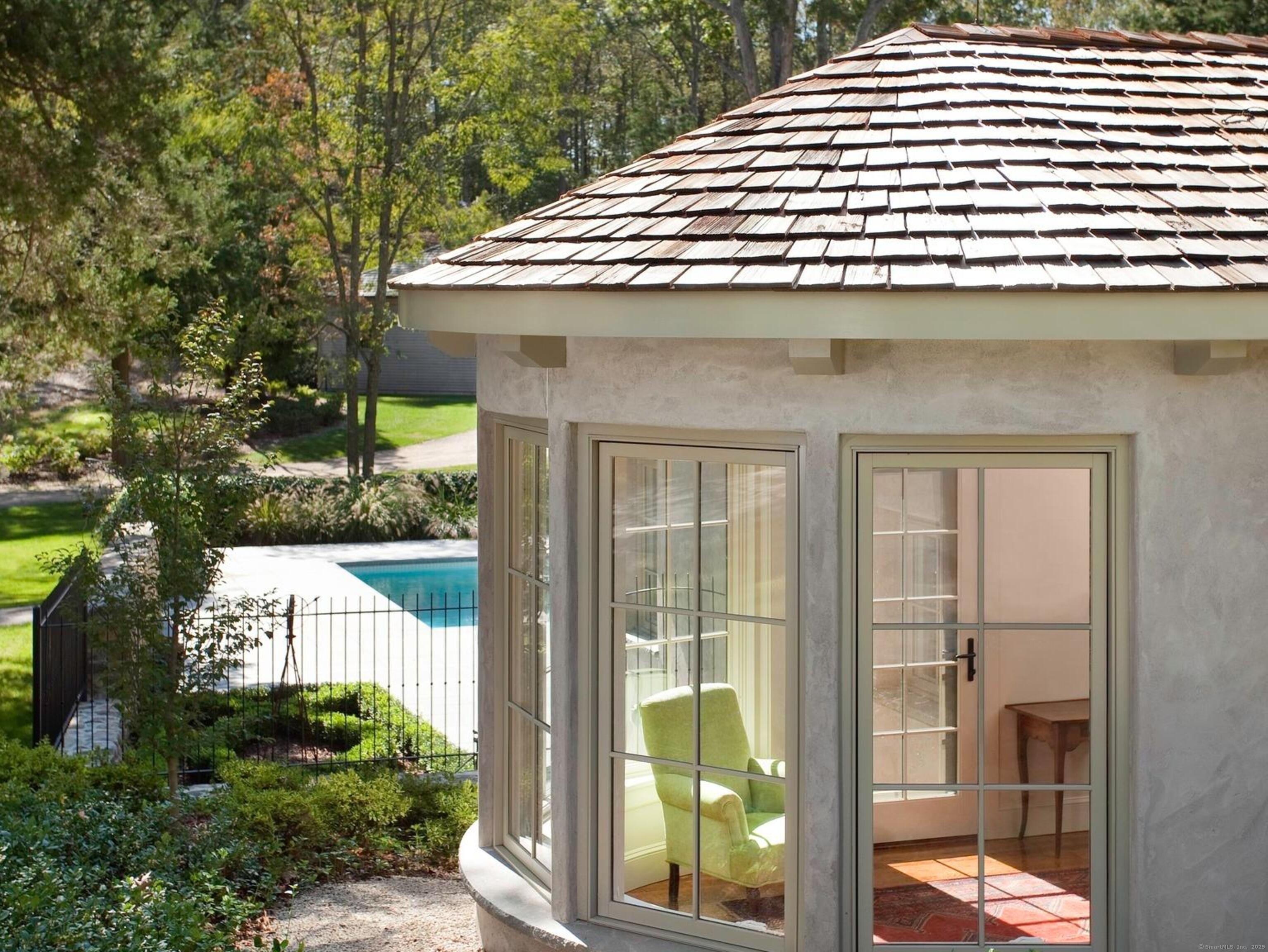 213 Beaver Brook Road Lyme, CT 06371 - Photo 24 of 38 a view of a house with a balcony