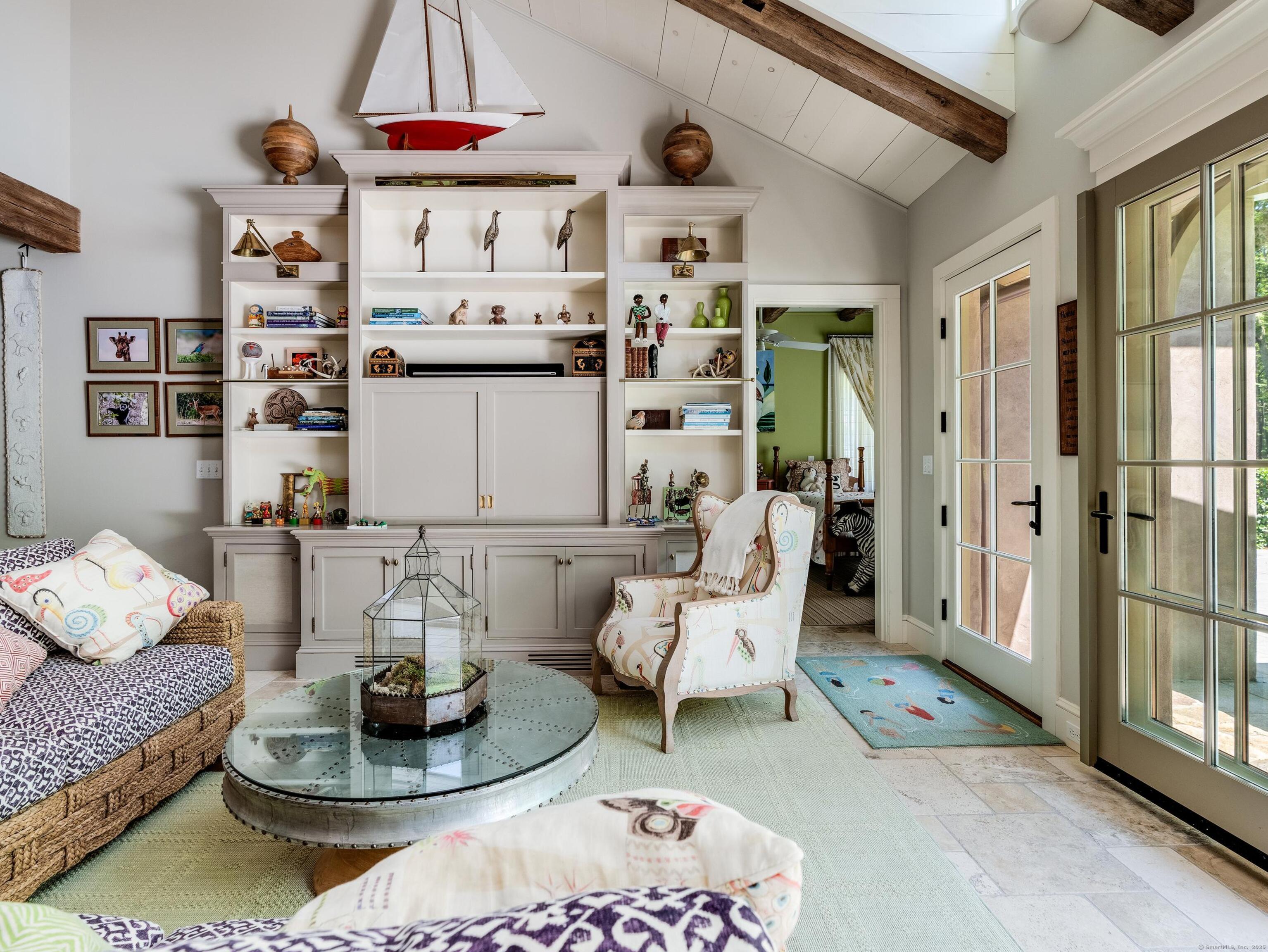 213 Beaver Brook Road Lyme, CT 06371 - Photo 28 of 38 a living room with furniture and wooden floor
