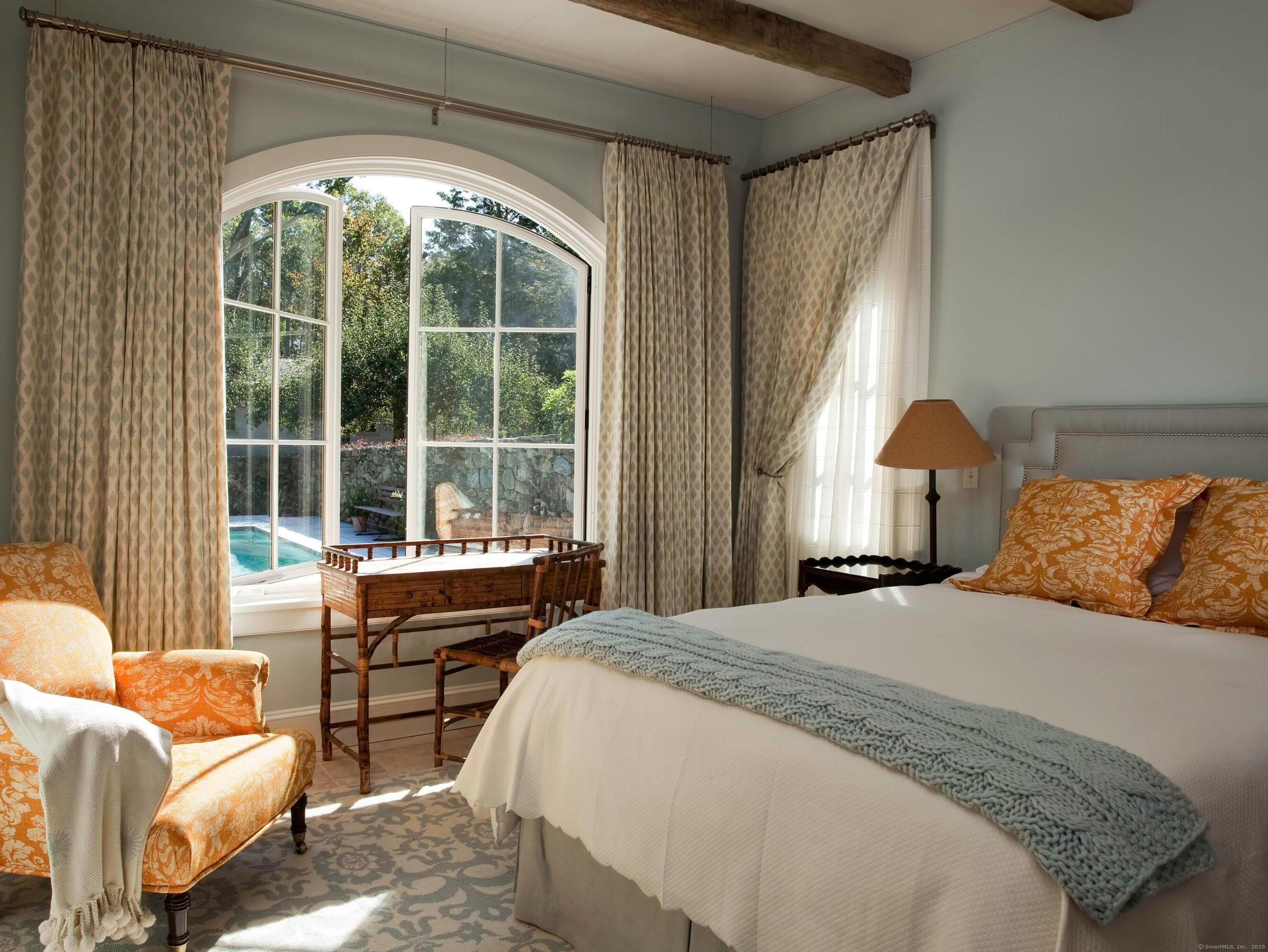 213 Beaver Brook Road Lyme, CT 06371 - Photo 30 of 38 a bed room with a bed and a couch