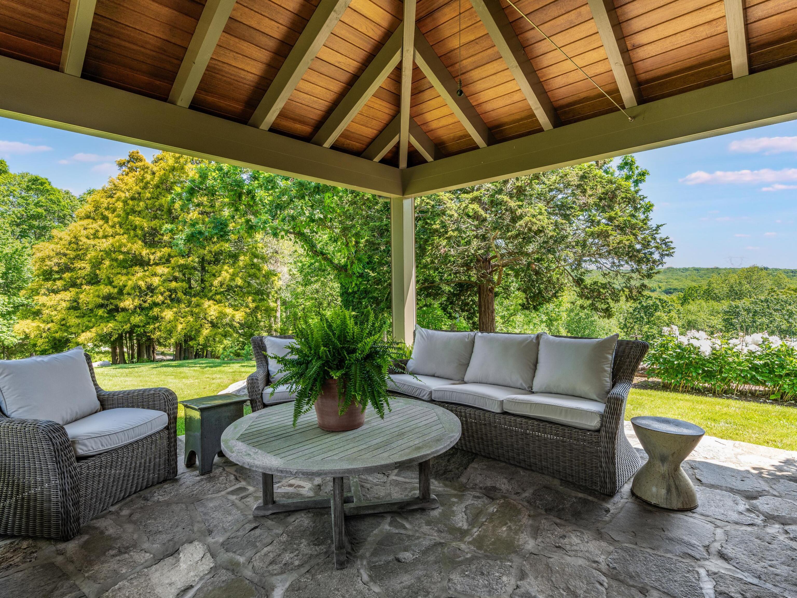 213 Beaver Brook Road Lyme, CT 06371 - Photo 3 of 38 a outdoor living space with furniture and garden view
