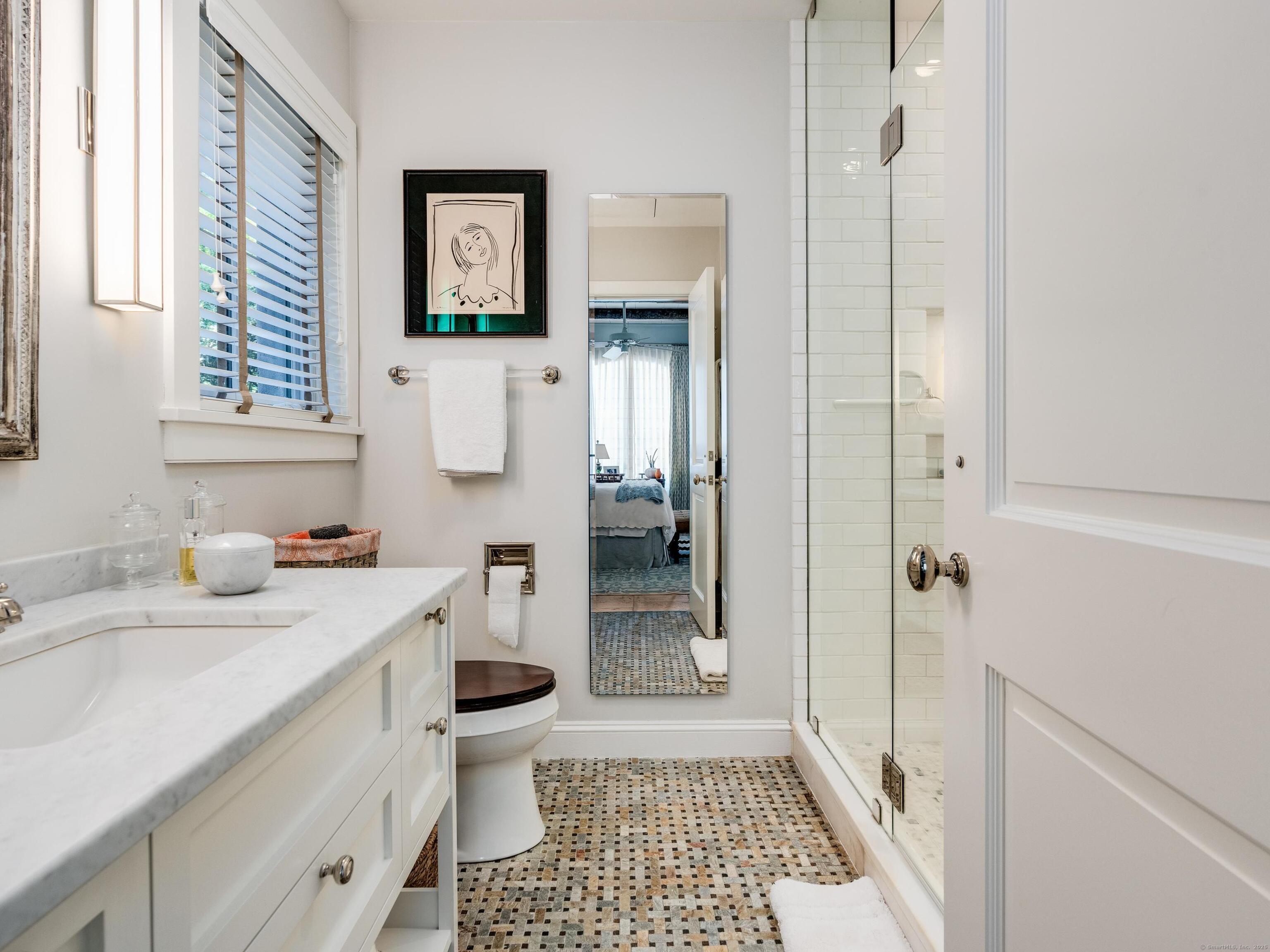 213 Beaver Brook Road Lyme, CT 06371 - Photo 31 of 38 a bathroom with a sink a toilet and shower