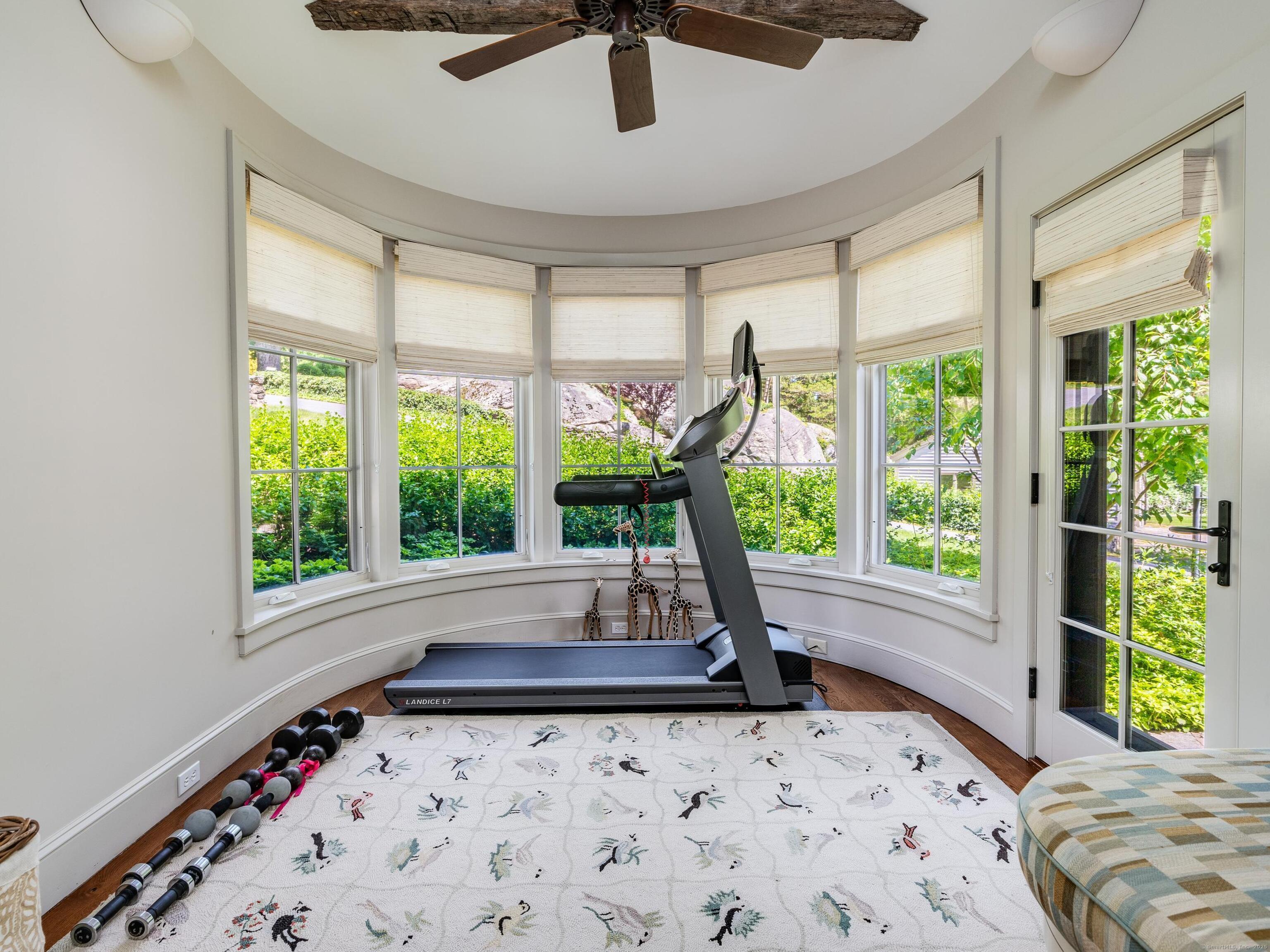 213 Beaver Brook Road Lyme, CT 06371 - Photo 35 of 38 a view of a bedroom with a bed