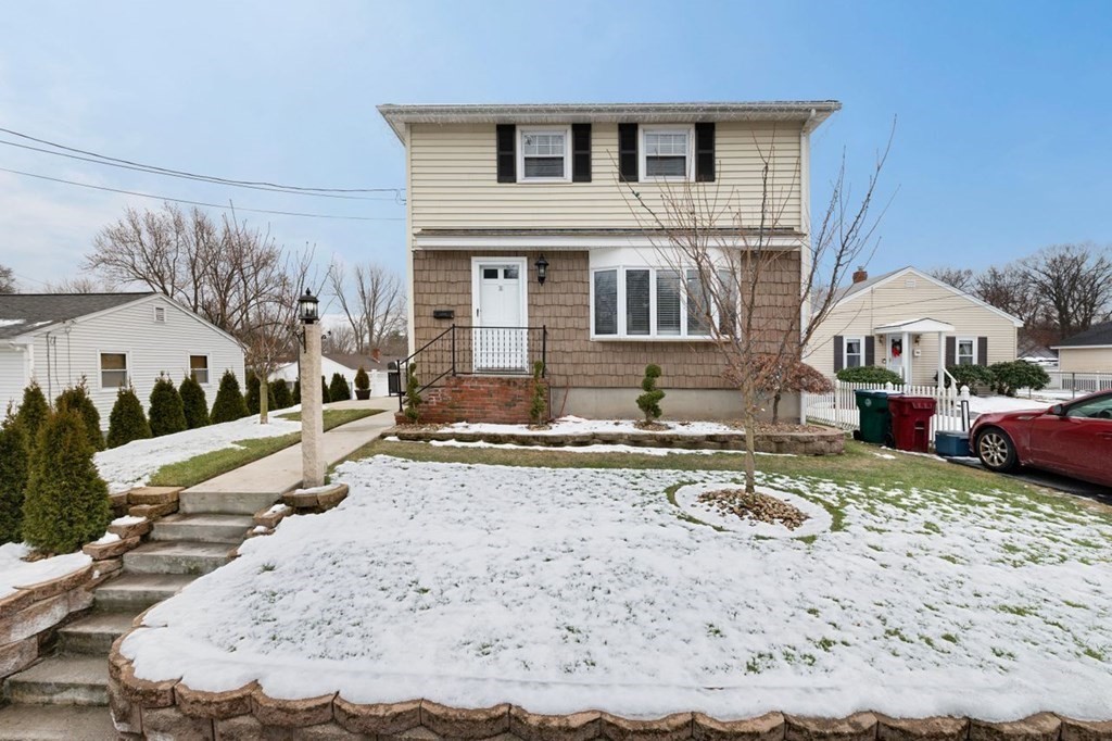36 Hally Road Lowell, MA 01854 - Photo 1 of 33 a view of a house with a snow in the yard