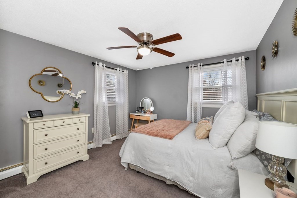 36 Hally Road Lowell, MA 01854 - Photo 17 of 33 a bedroom with a bed and window