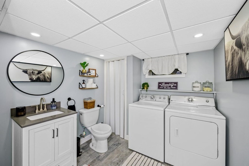 36 Hally Road Lowell, MA 01854 - Photo 22 of 33 a room with a washer and dryer