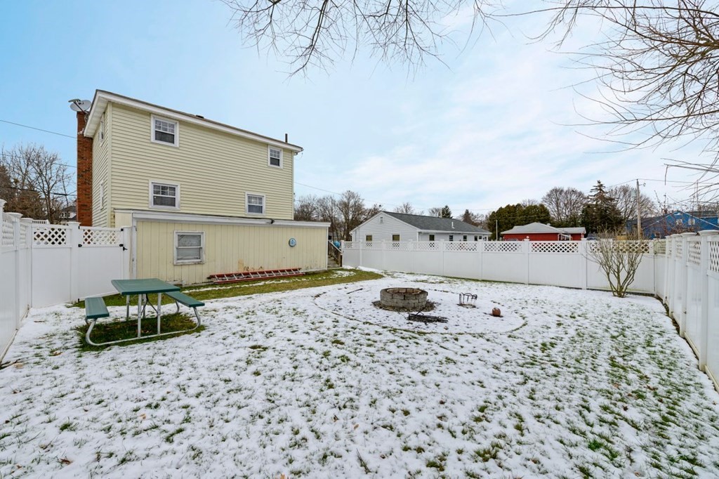 36 Hally Road Lowell, MA 01854 - Photo 28 of 33 a view of a terrace with a bench