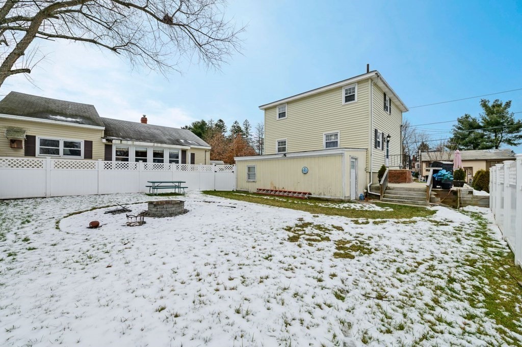 36 Hally Road Lowell, MA 01854 - Photo 30 of 33 a view of a house with a yard