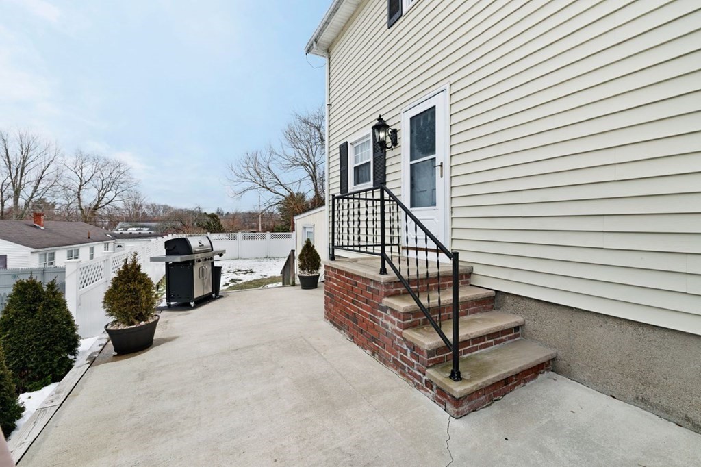 36 Hally Road Lowell, MA 01854 - Photo 31 of 33 a view of a terrace with chairs