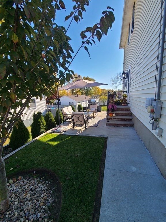 36 Hally Road Lowell, MA 01854 - Photo 32 of 33 a view of a outdoor space with seating area