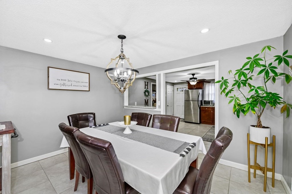 36 Hally Road Lowell, MA 01854 - Photo 9 of 33 a view of a dining room with furniture and chandelier