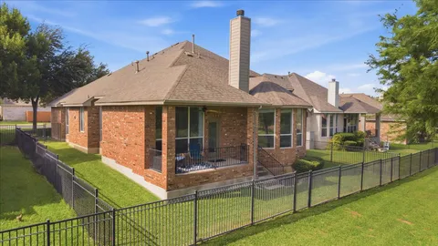 a front view of house with yard and outdoor seating