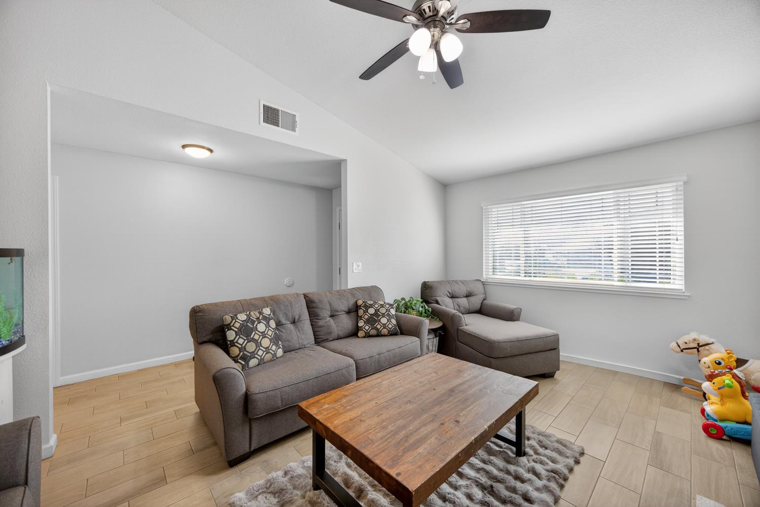 3237 Oriole Way Antelope, CA 95843 - Photo 12 of 47 a living room with furniture and a window