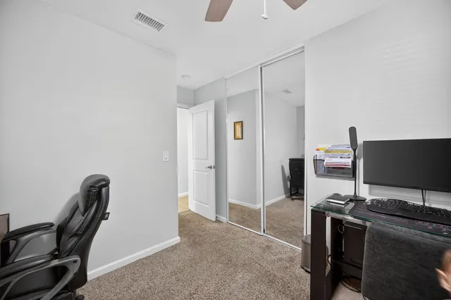 a view of a terrace with chairs