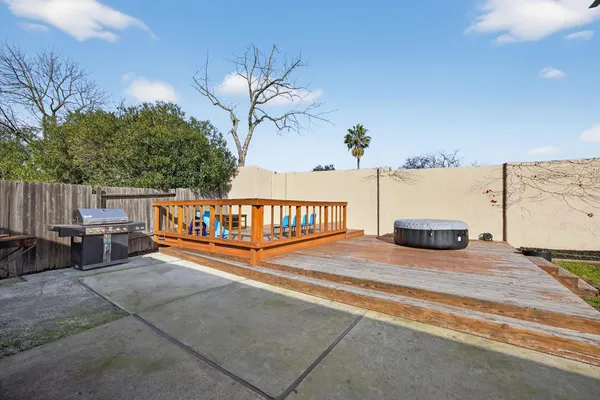swimming pool view with a sitting space