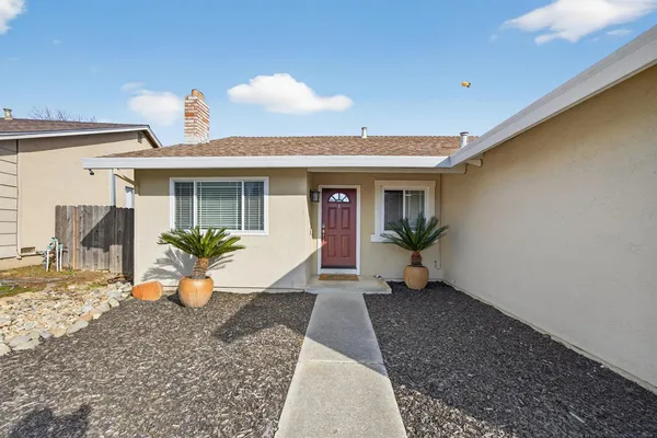 a view of a house with a patio
