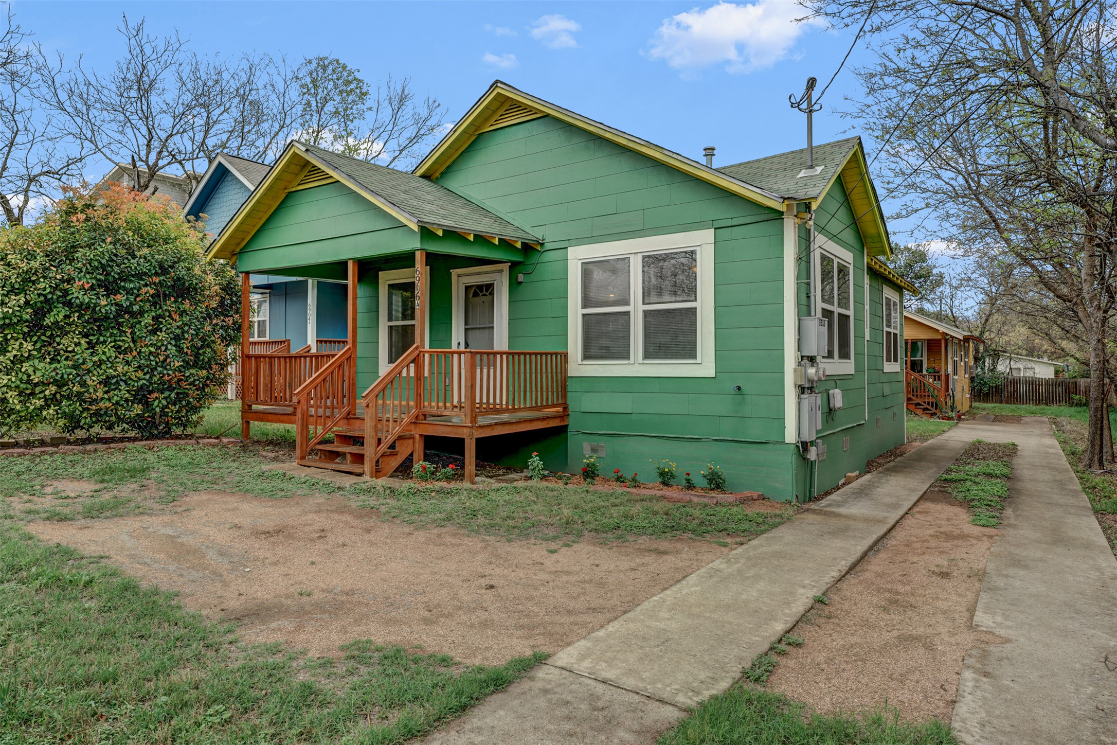 6906 Carver Avenue, Unit A Austin, TX 78752 - Photo 3 of 24 Bungalow with a porch and roof with shingles