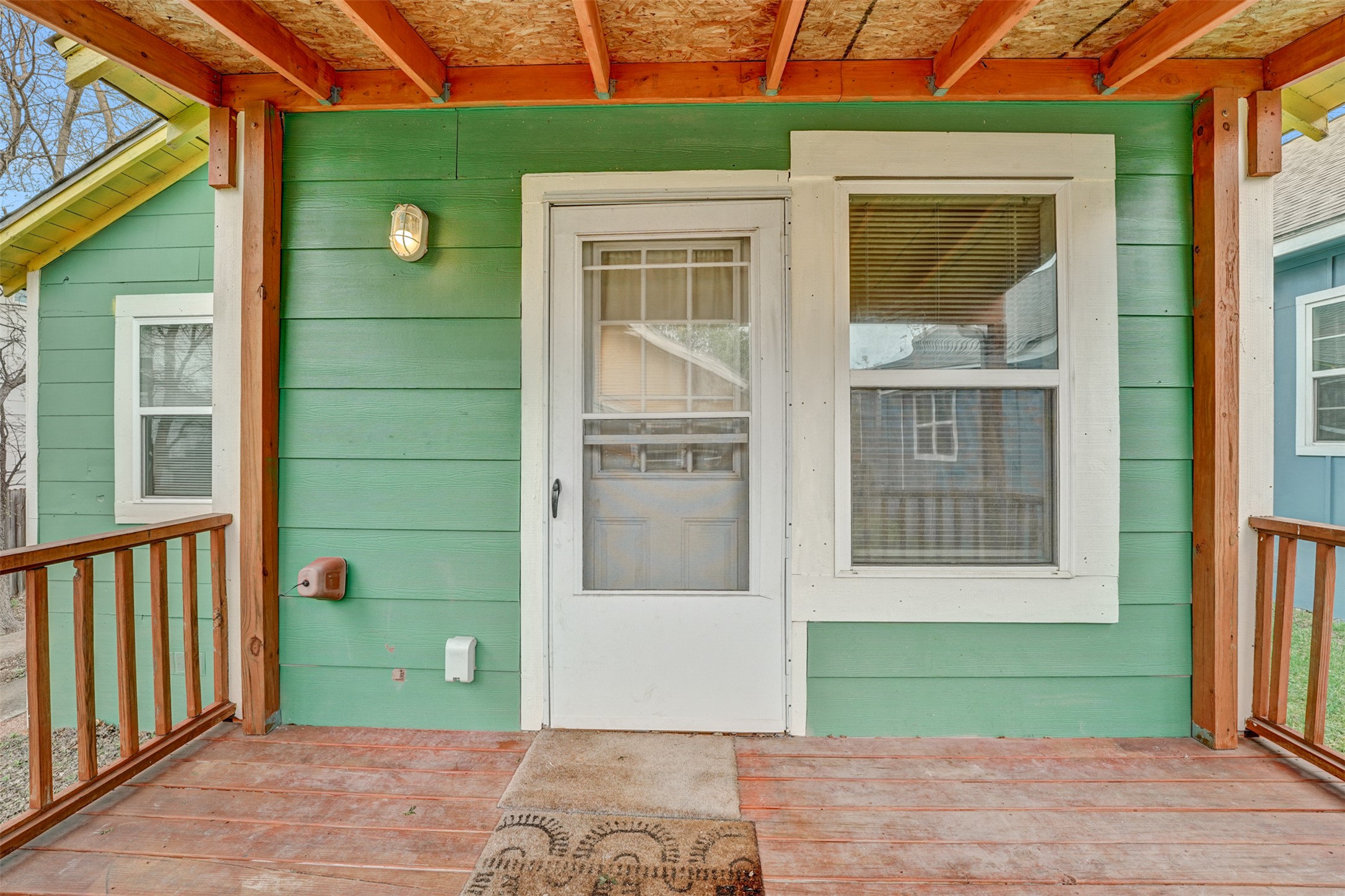 6906 Carver Avenue, Unit A Austin, TX 78752 - Photo 5 of 24 Entrance to property featuring a wooden deck