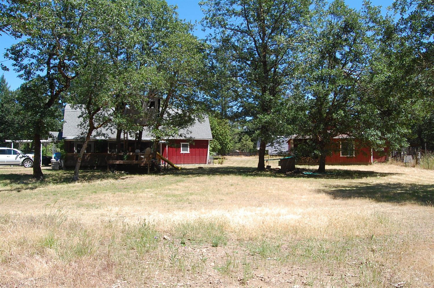 6006 Rockydale Road Cave Junction, OR 97523 - Photo 8 of 33 View of both home and shop