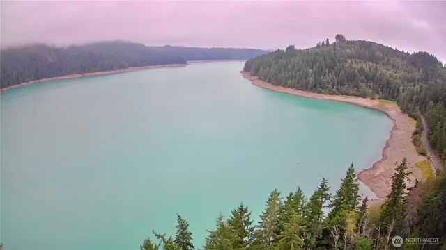 a view of a lake with a yard