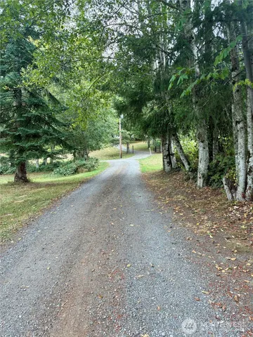 a view of a garden from a balcony
