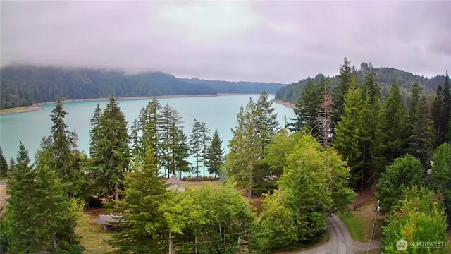 a view of a lake with a yard