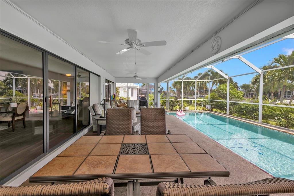 820 Bal Harbor Boulevard Punta Gorda, FL 33950 - Photo 21 of 56 a view of a living room and kitchen with a large window